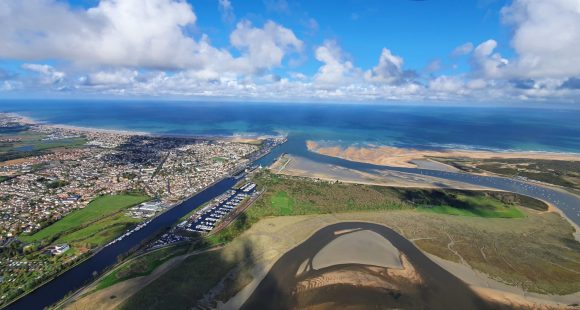 Fly over the D-Day landing beaches in a helicopter